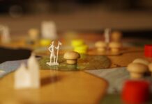 ‘뇌건강’ 지키는 일상 루틴, 지금 시작하는 작지만 큰 변화 a close up of a board game with figurines on it