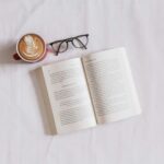 마음 챙김이 일상 건강 관리에 미치는 긍정적 변화…한국형 실천 루틴 제안 book near eyeglasses and cappuccino